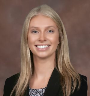 Alana Monson on Brown Background